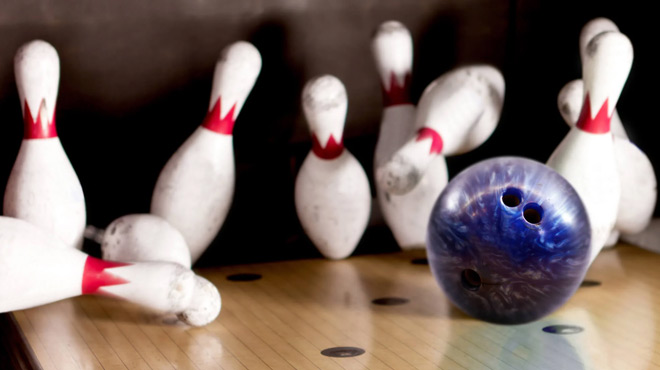 A Bowling Ball Hitting the Pins