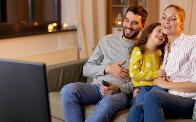 A Family Watching TV and Enjoying Their Evening A Family Watching TV and Enjoying Their Evening