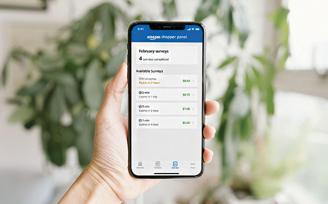 A Hand Holding a Phone with Amazon Shopper Panel On It