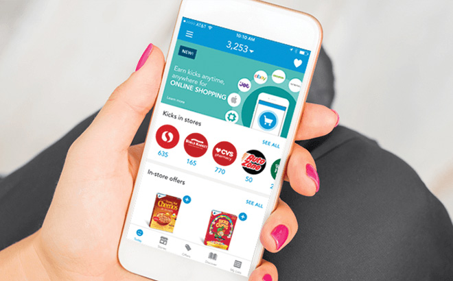 A Hand Holding a Phone with the Shopkick App On It