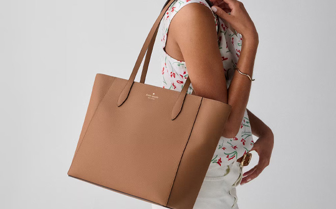 A Person Holding Kate Spade Dana Tote Bag