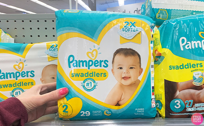 A Person Holding Pampers Swaddlers Diapers