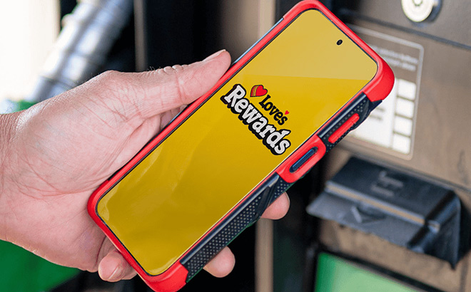 A Person Holding Phone with Loves Rewards App