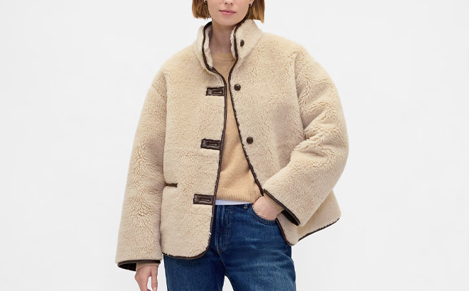 A Person Wearing GAP Recycled Sherpa Vegan Leather Trim Jacket