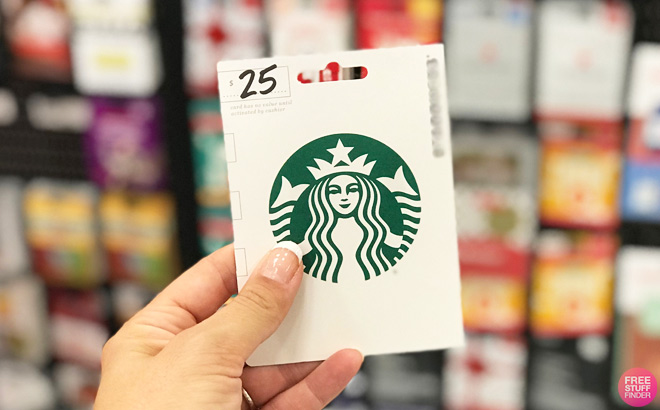 A Woman Holding Starbucks Gift Card