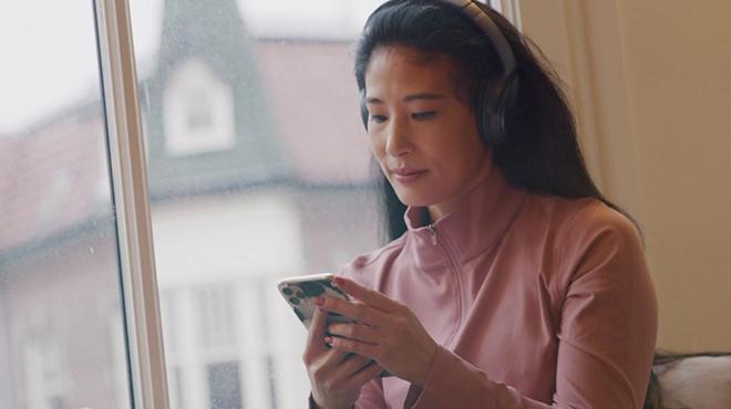 Woman Listening to Audiobook