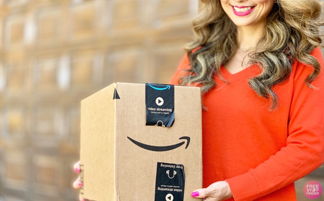 Woman Holding an Amazon Baby Welcome Box Woman Holding an Amazon Baby Welcome Box