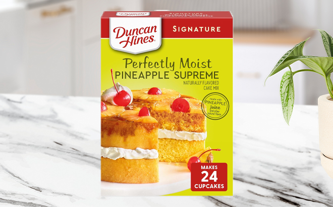 Duncan Hines Pineapple Supreme Flavored Cake Mix on a Kitchen Counter