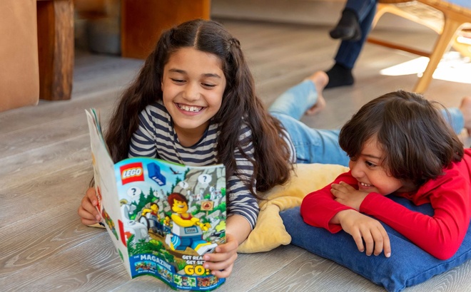 Two Kids Reading a LEGO Magazine