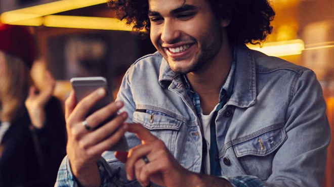Man Holding a Mobile Phone Man Holding a Mobile Phone