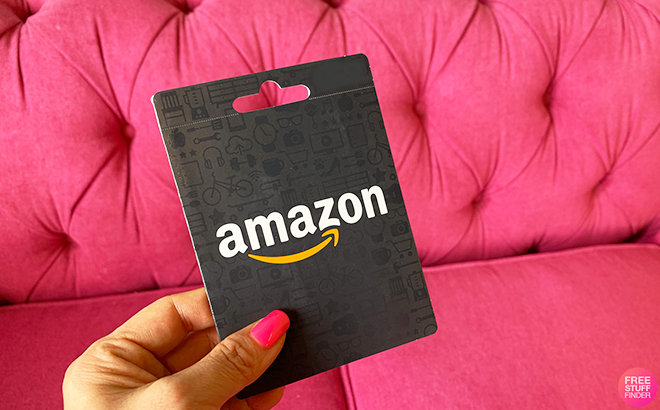 Person Holding Amazon Gift Card Person Holding Amazon Gift Card