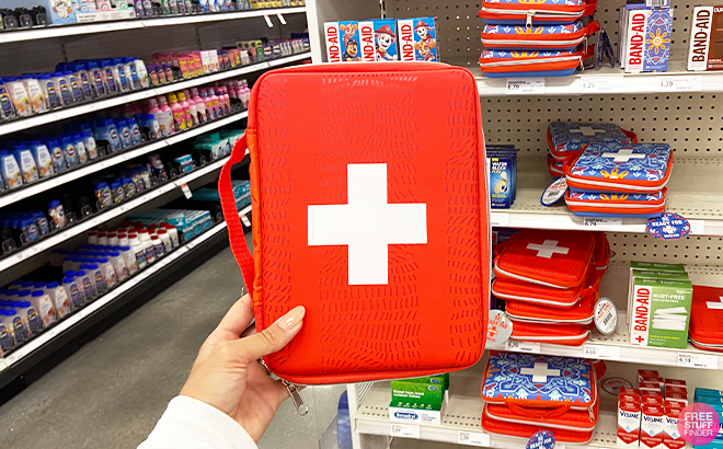 Person Holding Johnson And Johnson First Aid Bag Person Holding Johnson And Johnson First Aid Bag
