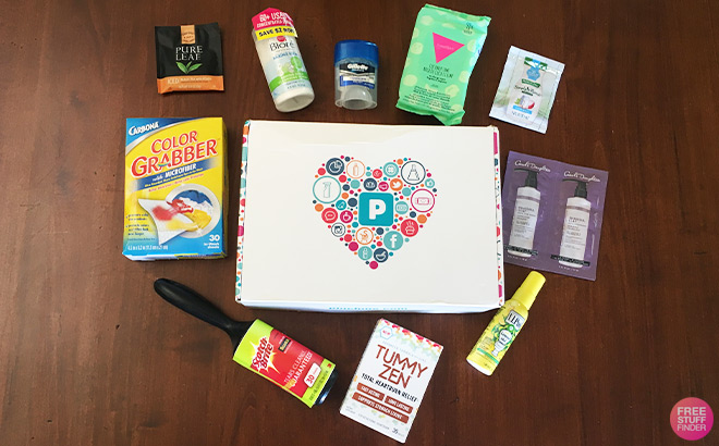 PinchMe Box with Products in Heart Shape Around it PinchMe Box with Products in Heart Shape Around it