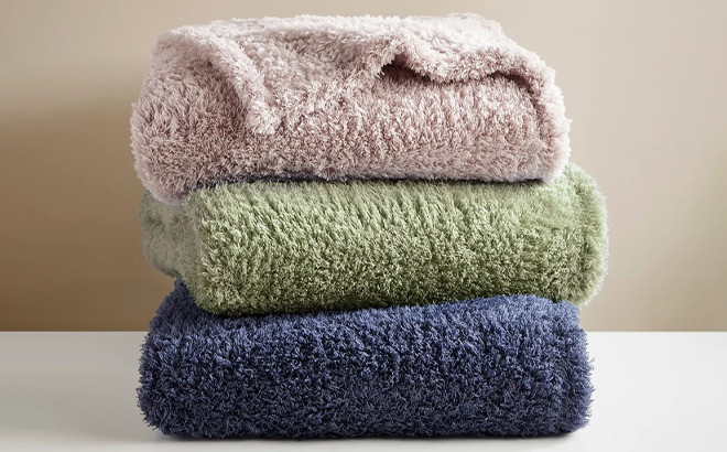 Premier Comfort Cozy Fluffy Throws Folded on a Table