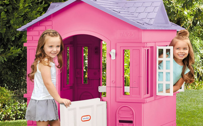 Two Girls Playing in Little Tikes Cape Cottage House