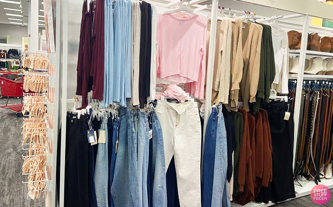Womens Tops and Bottoms on a Hanging Rack inside a Store Womens Tops and Bottoms on a Hanging Rack inside a Store